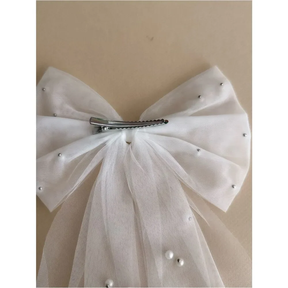 Pearl hair bow K46